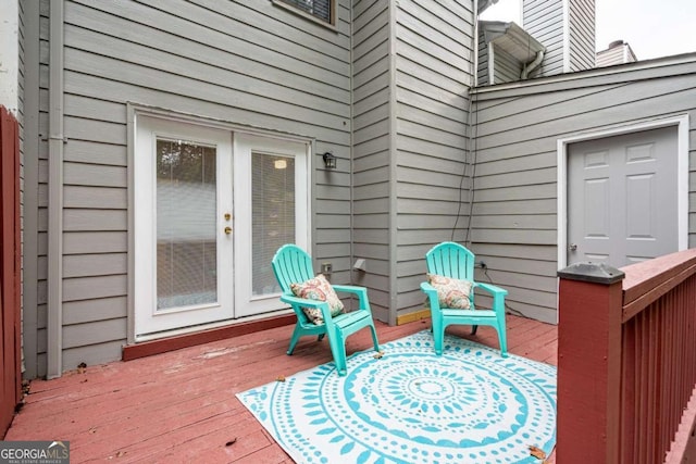 wooden deck featuring french doors