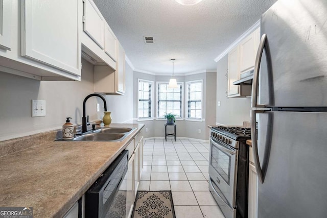 kitchen with white cabinetry, sink, hanging light fixtures, stainless steel appliances, and crown molding