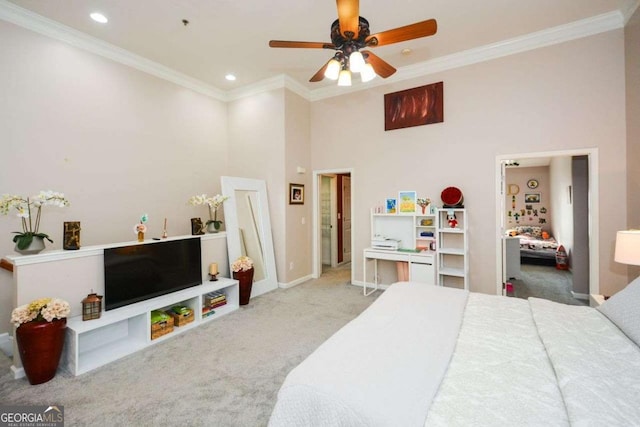 bedroom featuring a towering ceiling, light colored carpet, ceiling fan, and crown molding