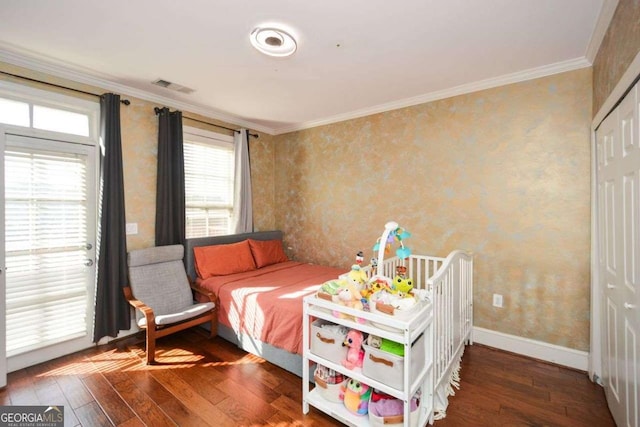 bedroom featuring multiple windows, crown molding, and dark wood-type flooring