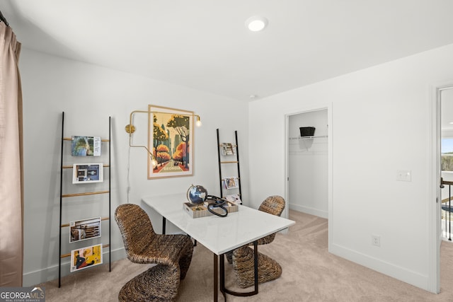 view of carpeted dining area