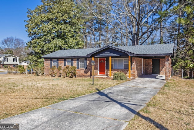 ranch-style home with a front yard and a carport