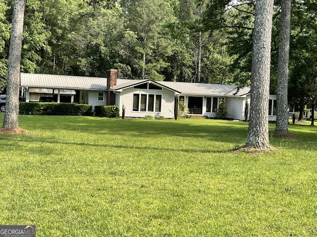 1088 New Rosedale Rd NE, Armuchee, GA 30105 - ranch-style home featuring a front lawn, metal roof, and a chimney