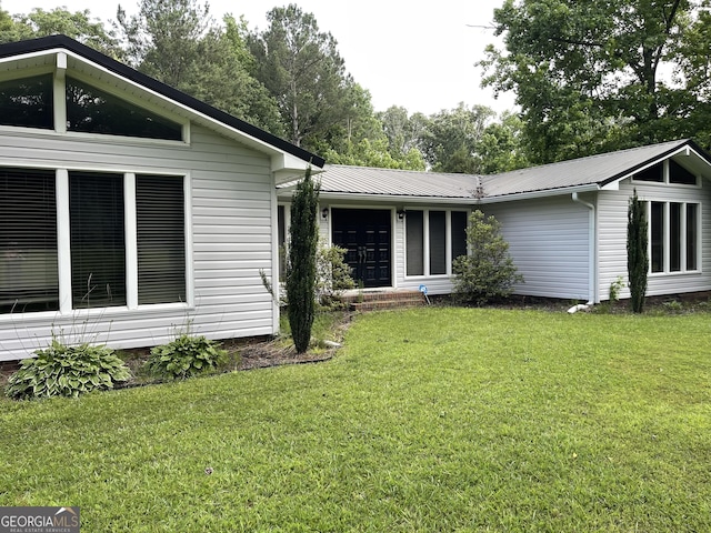 1088 New Rosedale Rd NE, Armuchee, GA 30105 - view of front of house with a front lawn and metal roof