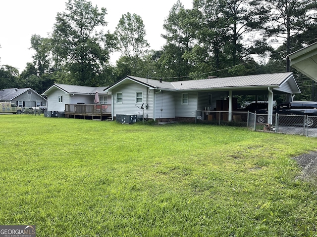 1088 New Rosedale Rd NE, Armuchee, GA 30105 - back of house with a deck, metal roof, and view of scattered trees