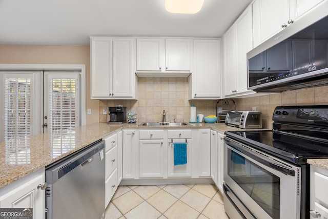 kitchen with white cabinetry, sink, and appliances with stainless steel finishes