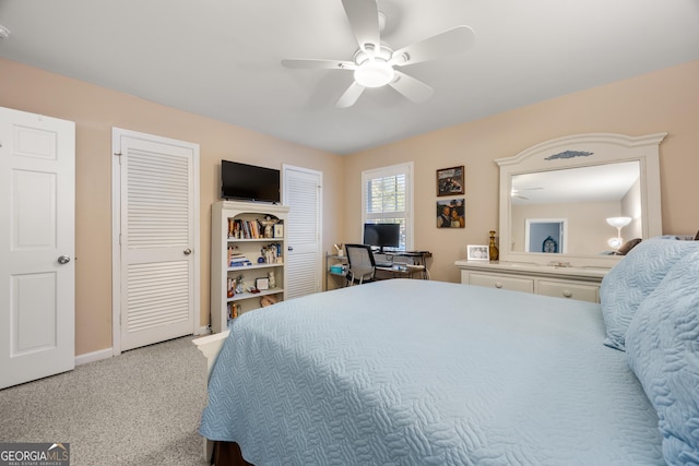 carpeted bedroom featuring ceiling fan