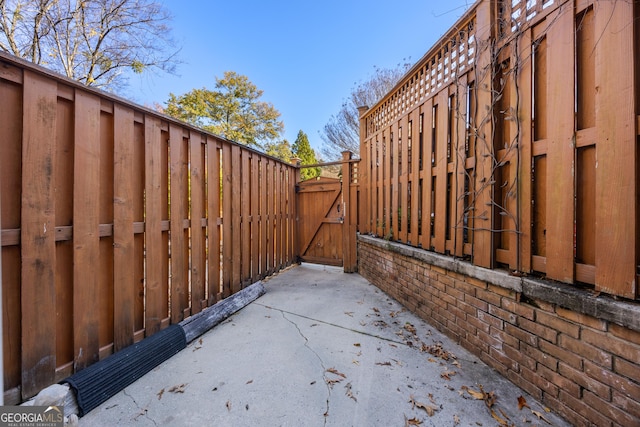 view of side of home with a patio