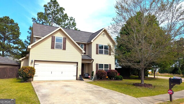 163 Sourwood Ln, Warner Robins, GA 31093 - view of property with a garage
