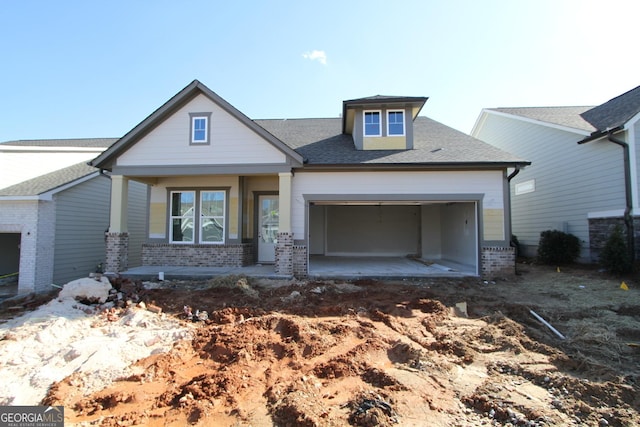 craftsman-style house featuring a garage