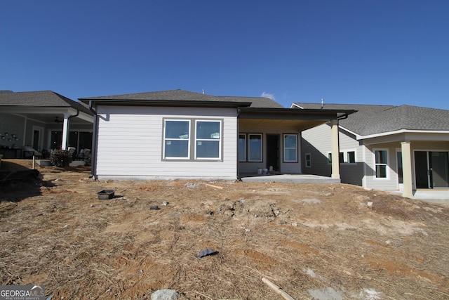 rear view of house with a patio area