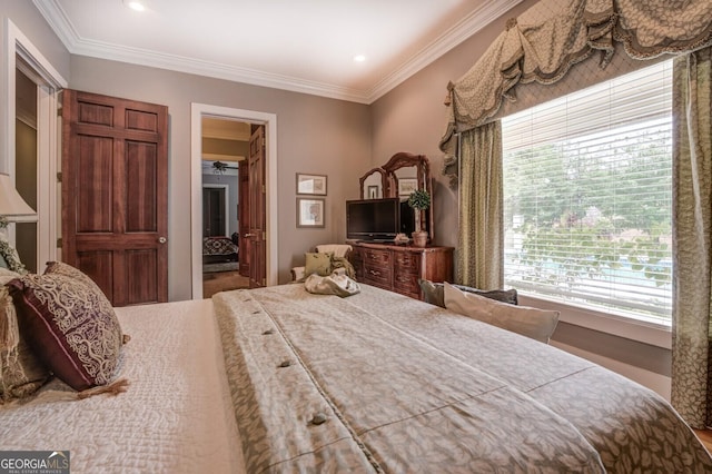 bedroom with crown molding