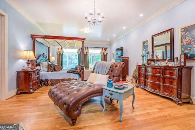 bedroom featuring a notable chandelier, crown molding, and light hardwood / wood-style flooring