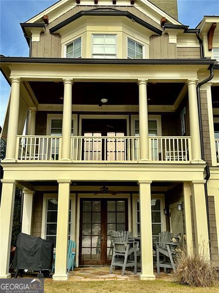 rear view of house with a balcony