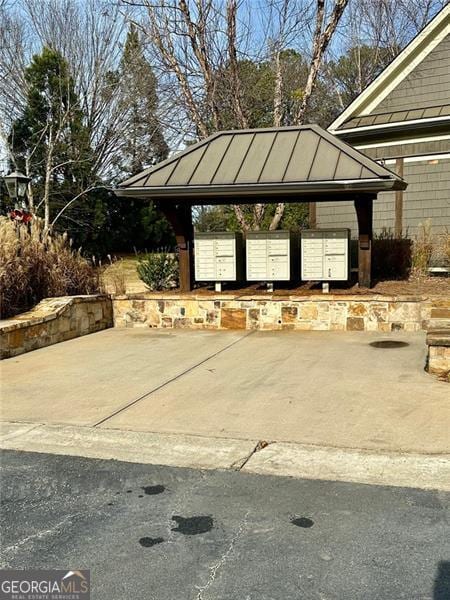 view of community with a gazebo and mail boxes