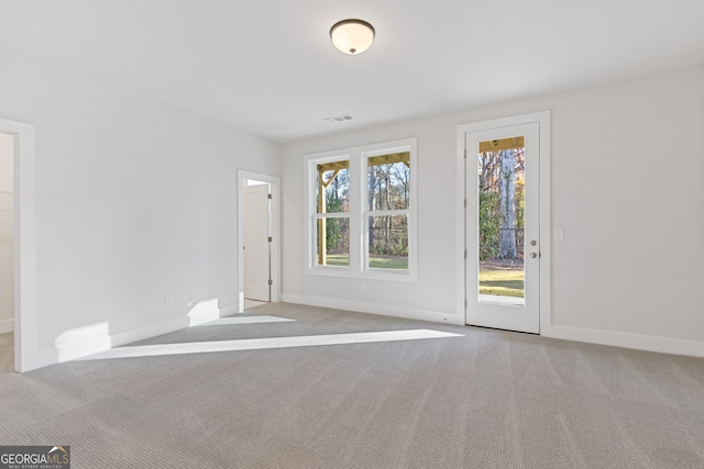 view of carpeted spare room