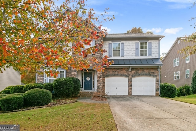 view of front of home with a garage and a front yard