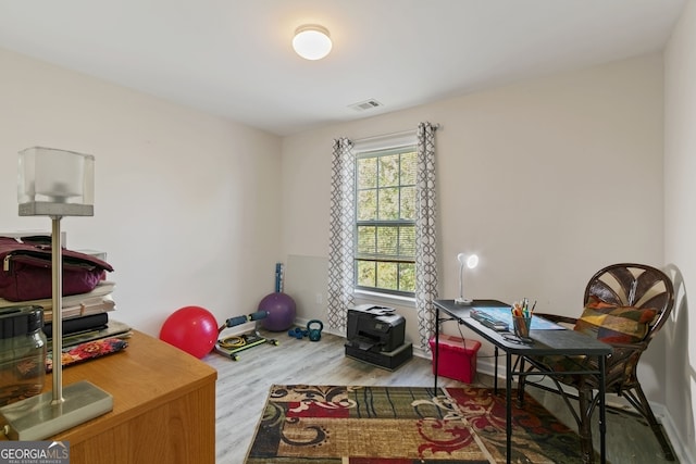 office featuring hardwood / wood-style floors