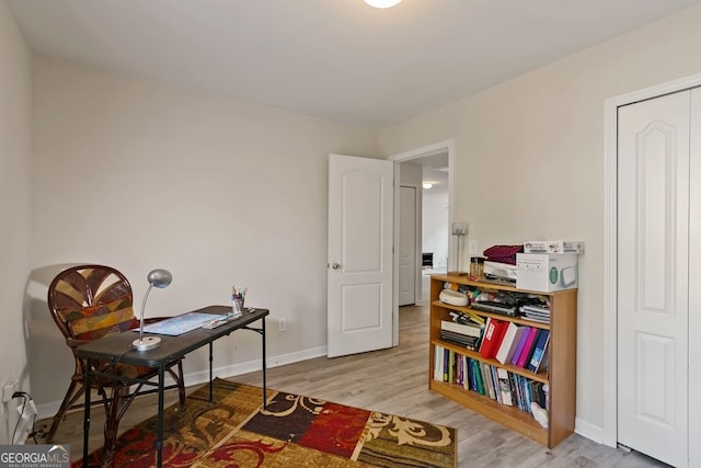 office area with wood-type flooring