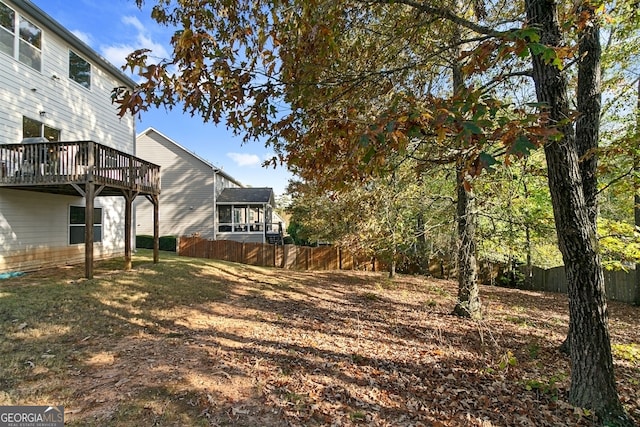 view of yard with a deck