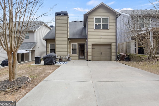 front of property featuring a garage