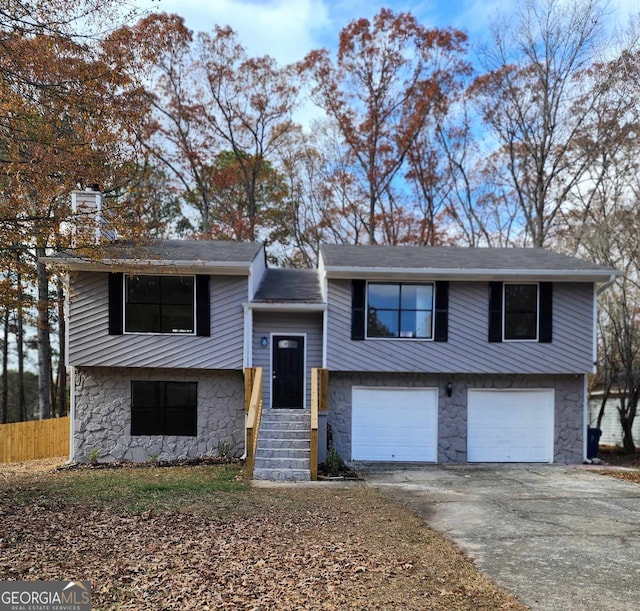 bi-level home featuring a garage