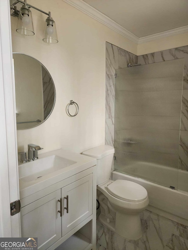 full bathroom with vanity, tiled shower / bath combo, toilet, and ornamental molding