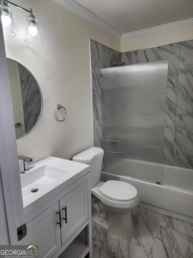 full bathroom with vanity, toilet, combined bath / shower with glass door, and ornamental molding