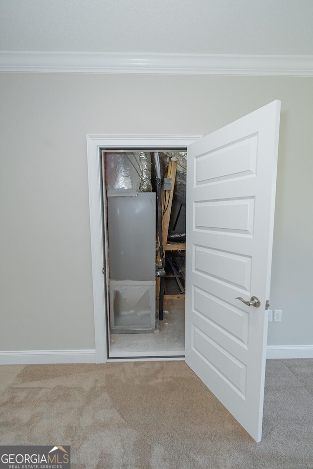 interior space with crown molding