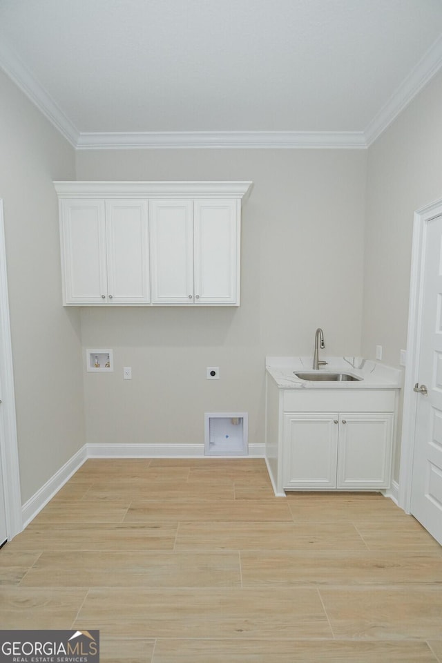 laundry room featuring cabinets, hookup for a washing machine, ornamental molding, electric dryer hookup, and sink