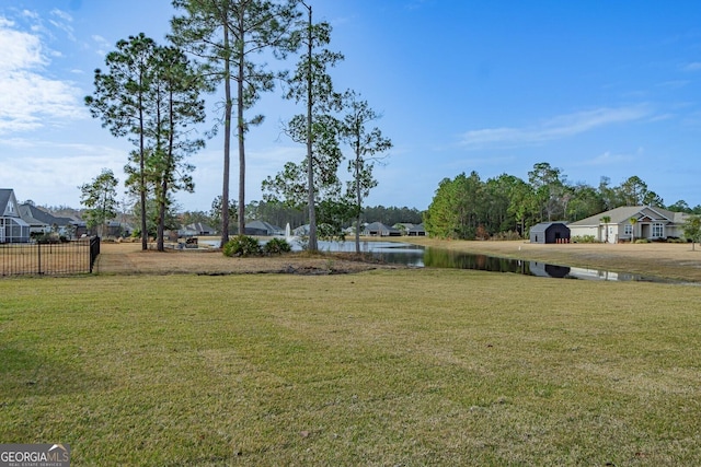 view of yard featuring a water view