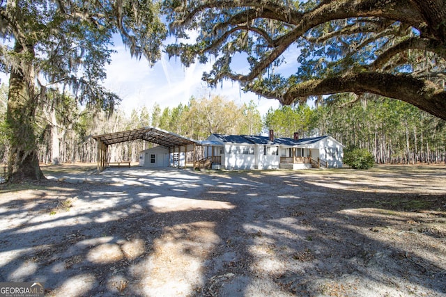 view of front of house featuring a carport