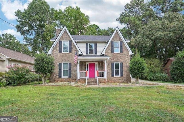 view of front of property with a front lawn