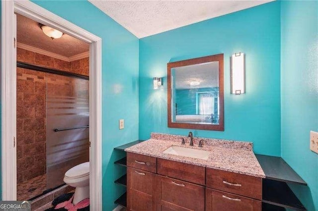 bathroom with walk in shower, ornamental molding, vanity, a textured ceiling, and toilet