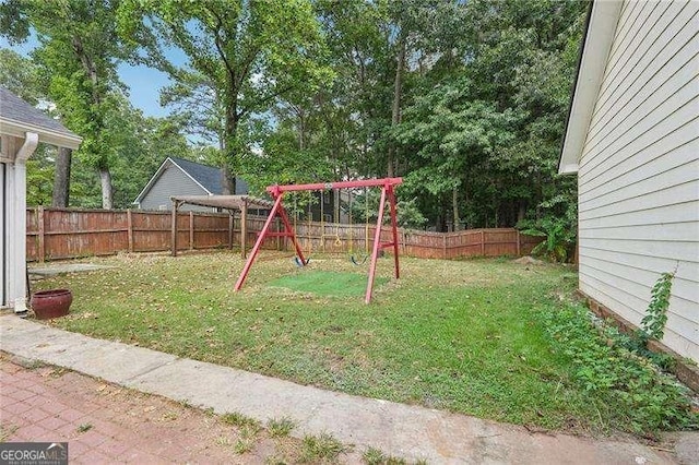 view of yard featuring a playground