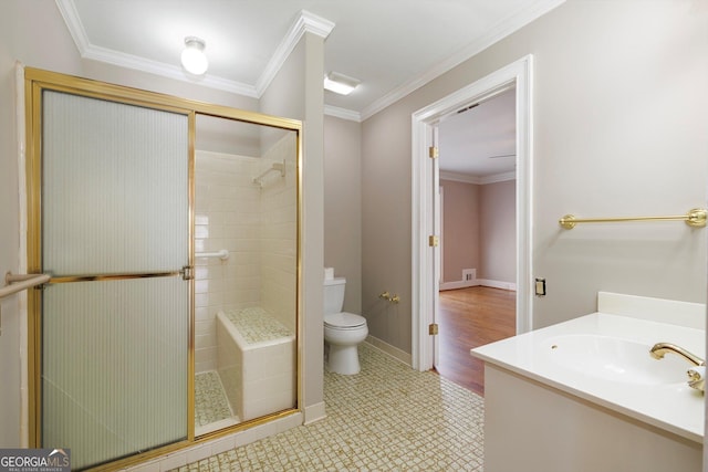 bathroom with vanity, a shower with door, crown molding, tile patterned flooring, and toilet