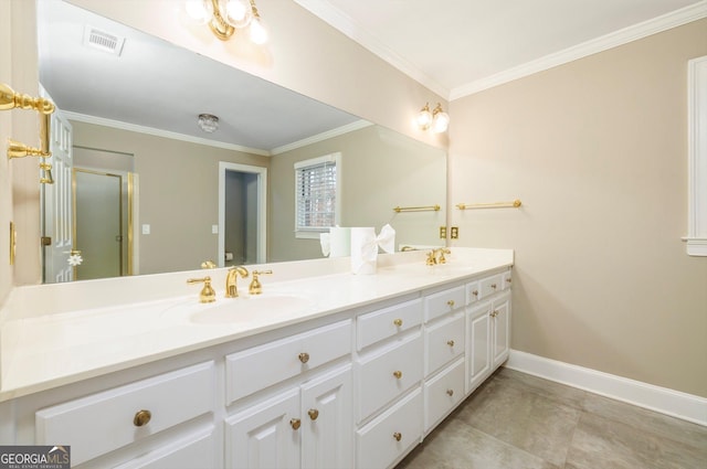 bathroom with tile patterned flooring, vanity, and crown molding