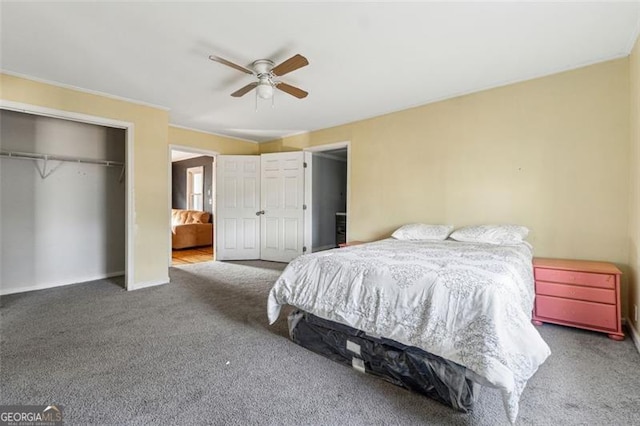 bedroom featuring carpet floors, a closet, and ceiling fan