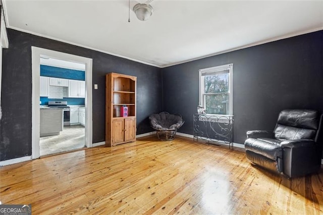 living area with light hardwood / wood-style floors