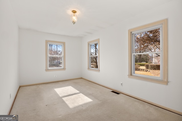 view of carpeted spare room