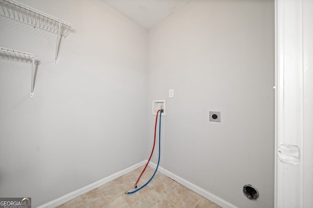 clothes washing area featuring washer hookup and hookup for an electric dryer