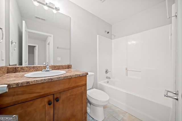 full bathroom with tile patterned flooring, shower / bathing tub combination, vanity, and toilet