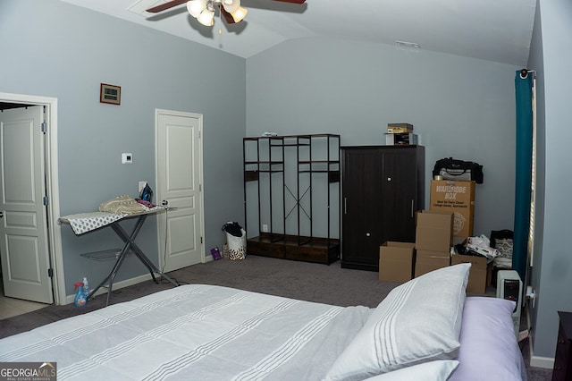 carpeted bedroom with ceiling fan and lofted ceiling