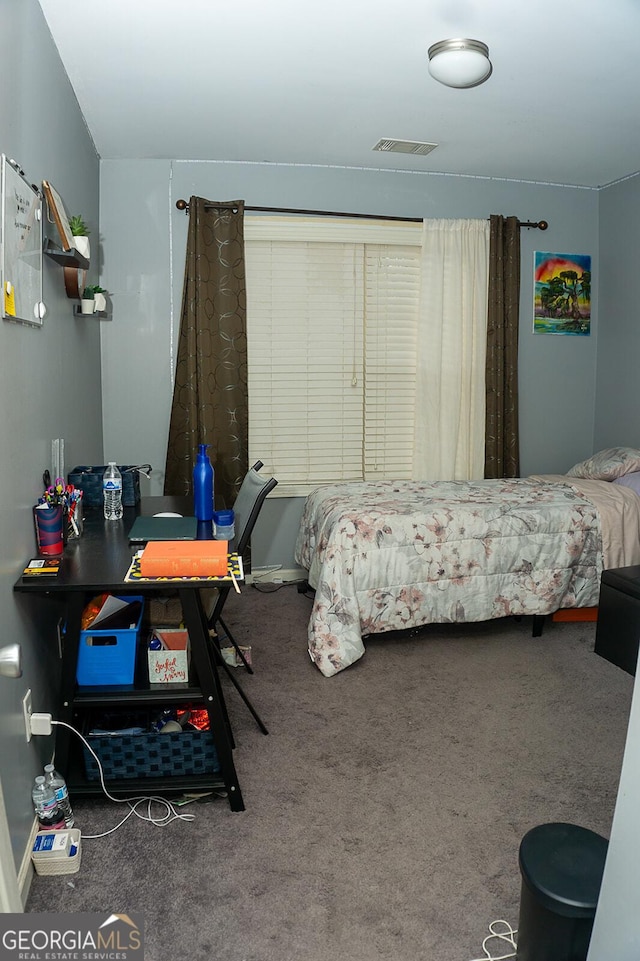 bedroom featuring carpet floors