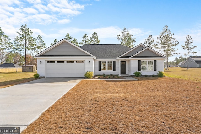 ranch-style house with a garage and a front lawn