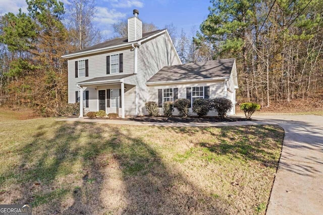 view of front of property featuring a front yard