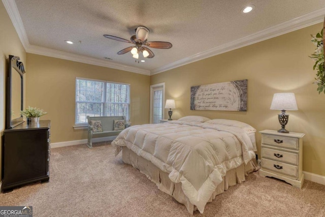 bedroom with ceiling fan, crown molding, light carpet, and a textured ceiling