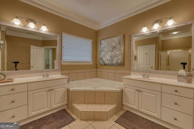 bathroom featuring tile patterned flooring, vanity, crown molding, and plus walk in shower