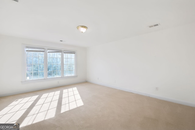 view of carpeted spare room