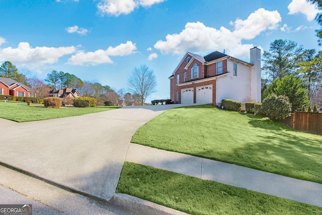 exterior space featuring a lawn and a garage